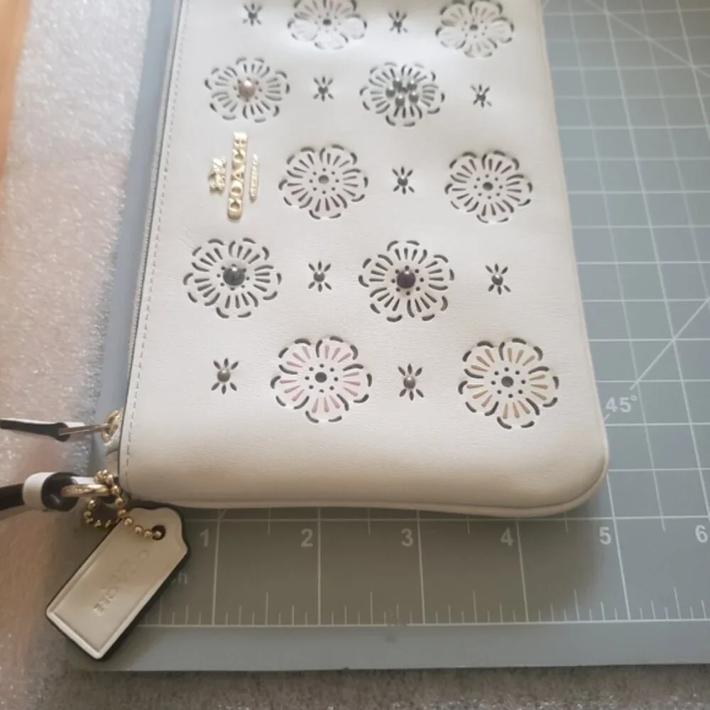 Coach White Leather Wristlet with Cut Out Tea Rose